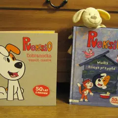 Dwie książki z Reksio: "Dobranocka wszech czasów" i "Wielka księga przygód". Na okładce drugiej widać Reksia w budzie i kota.