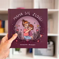 Okładka książki "Mama się złości", na której mama przytula dziecko.