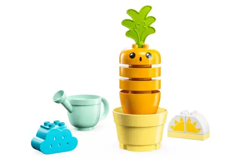 Zestaw z zabawkami: uśmiechnięta lego duplo marchewka w doniczce, niebieska chmurka, konewka i słońce.